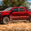Chevrolet Silverado ZRX vs Ford F-150 Raptor - Fight!